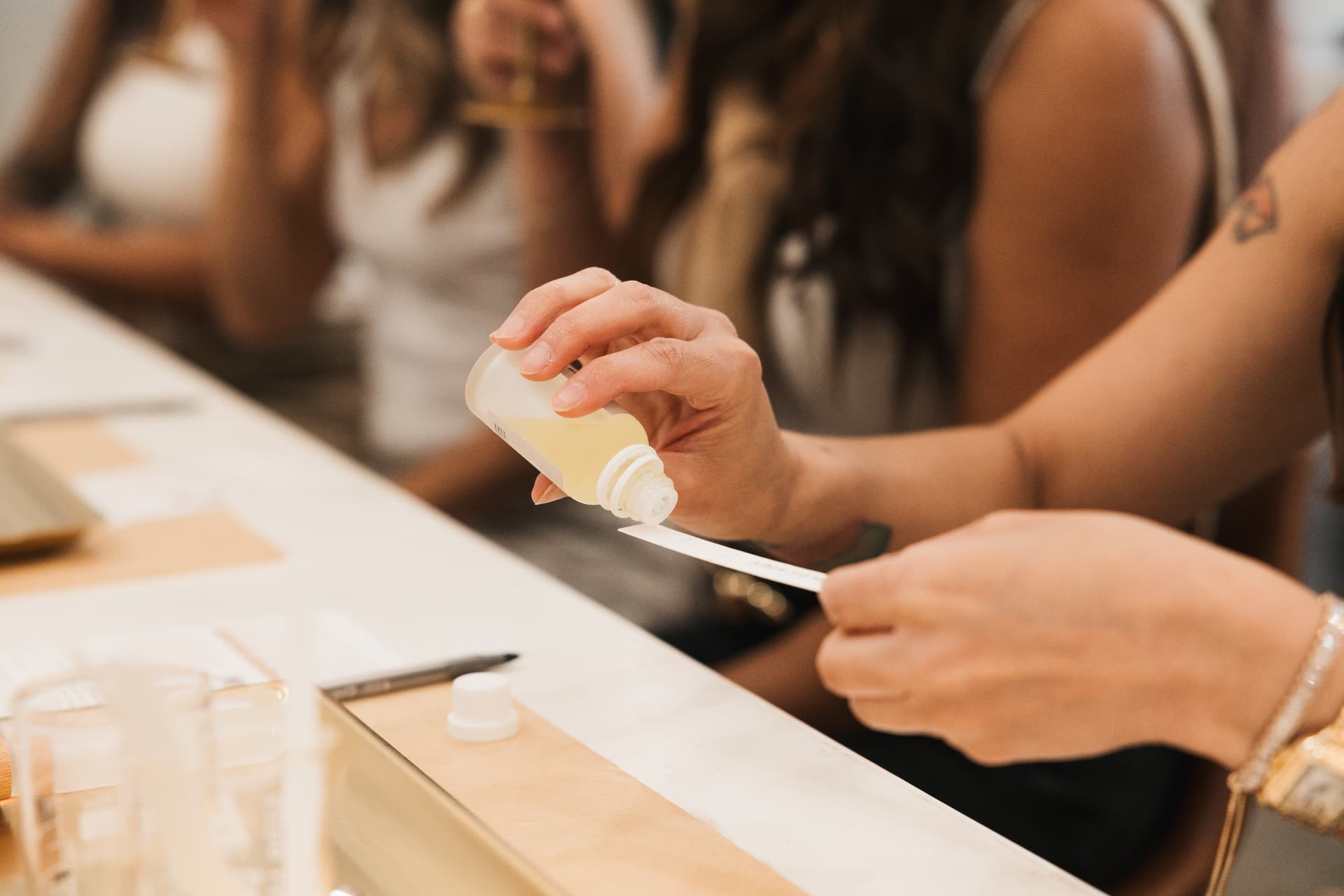 Fragrance oil applied to a testing strip during a blending session